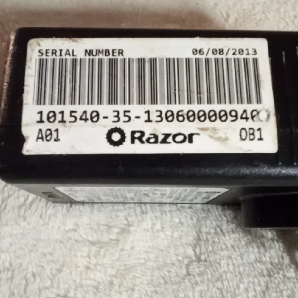 Razor Black Charger with Red Tag